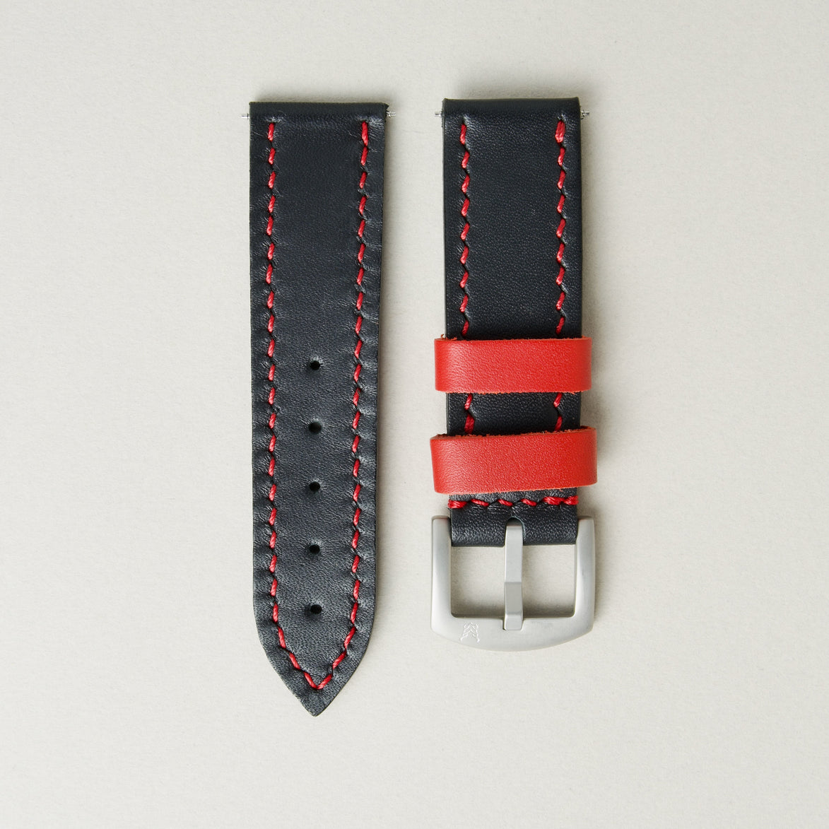 Midnight Black full-grain leather watch strap with stainless steel buckle, featuring red handmade stitching and matching red loops. Markore Hour Line.