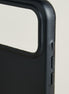 Detail of midnight black leather iphone 17 pro case with full cutout and buttons. Markore Shell Frame.