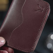 portrait unboxing video of markore ravi slip bifold wallet in espresso brown showing complete packaging and material quality