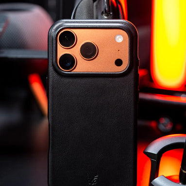 real life image of markore shell frame case on orange iphone 17 pro