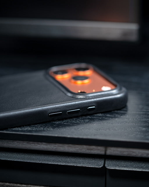 Close-up of Markore Shell Frame black Leather iPhone 17 case