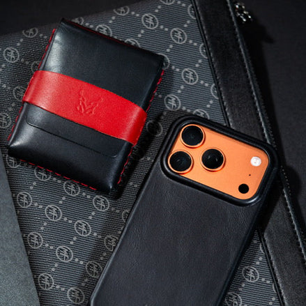Markore Sutlej Vault and Markore Shell Frame iphone 17 pro case in midnight black lying on canvas bag.